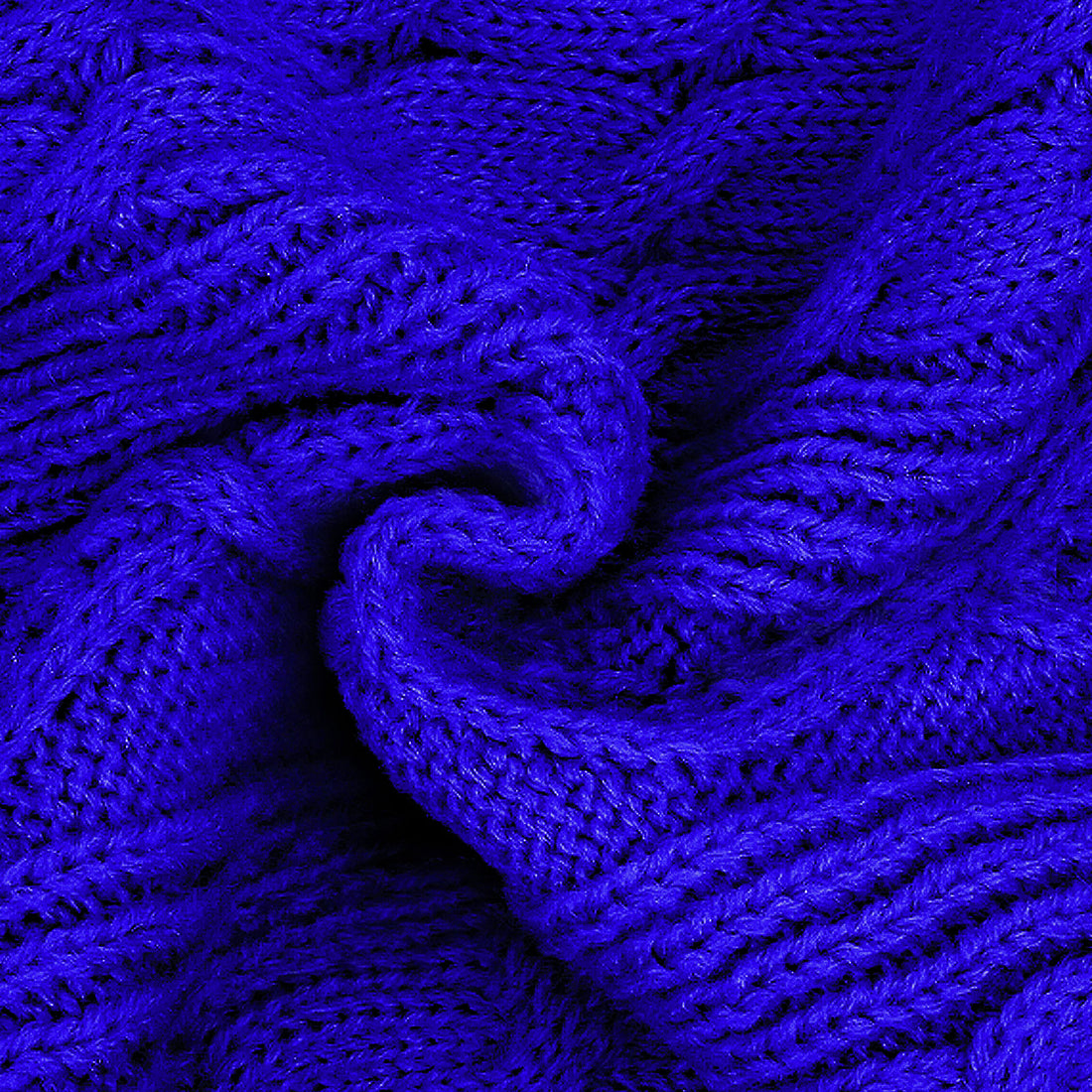Blue cable-knit dog sweater fabric with textured raised stitch pattern