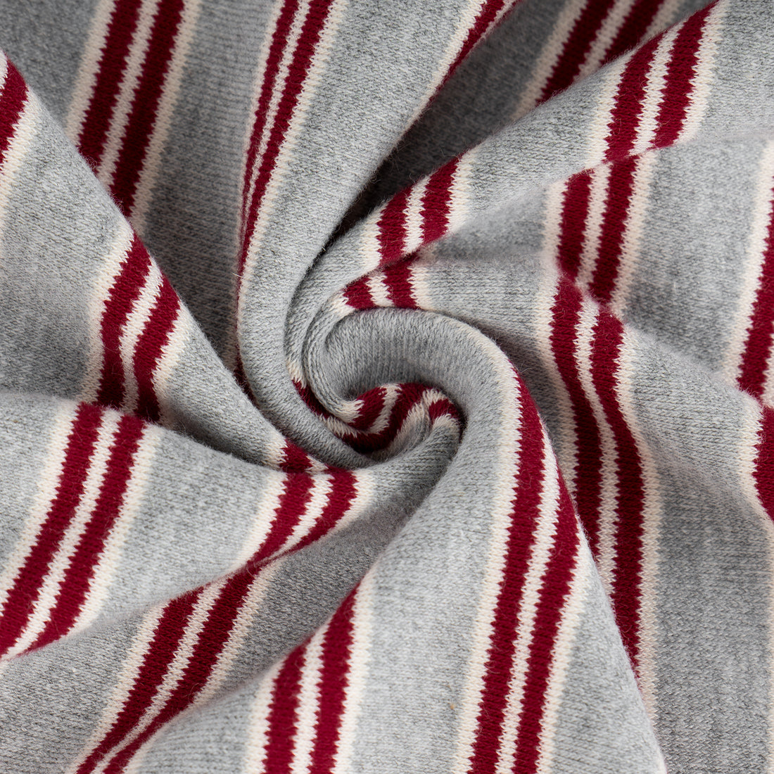 Close-up of soft gray fabric with narrow burgundy and white stripes