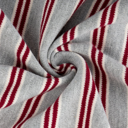 Close-up of soft gray fabric with narrow burgundy and white stripes