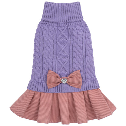 Light purple cable knit dog sweater dress with pink pleated skirt and jeweled bow, flat lay