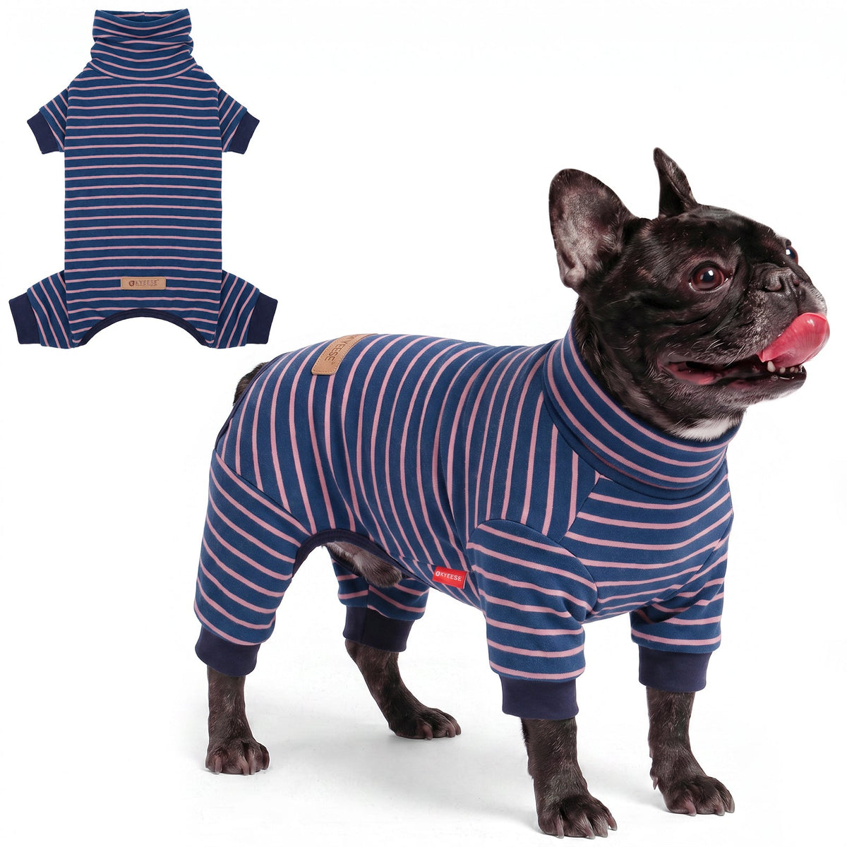 Black French bulldog in navy and pink striped pajamas, side view