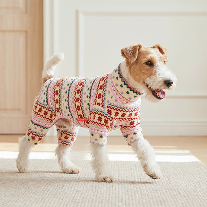 Pink Snowflake Dog Christmas Pajamas, cream and pink Fair Isle snowflake pattern, dog wearing the pajamas in a holiday or home setting