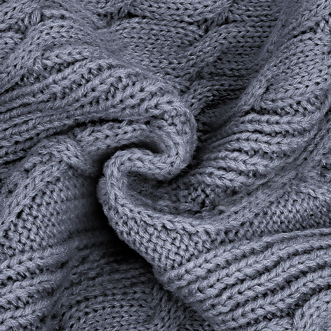 Gray cable knit dog sweater fabric close-up with twisted cable texture