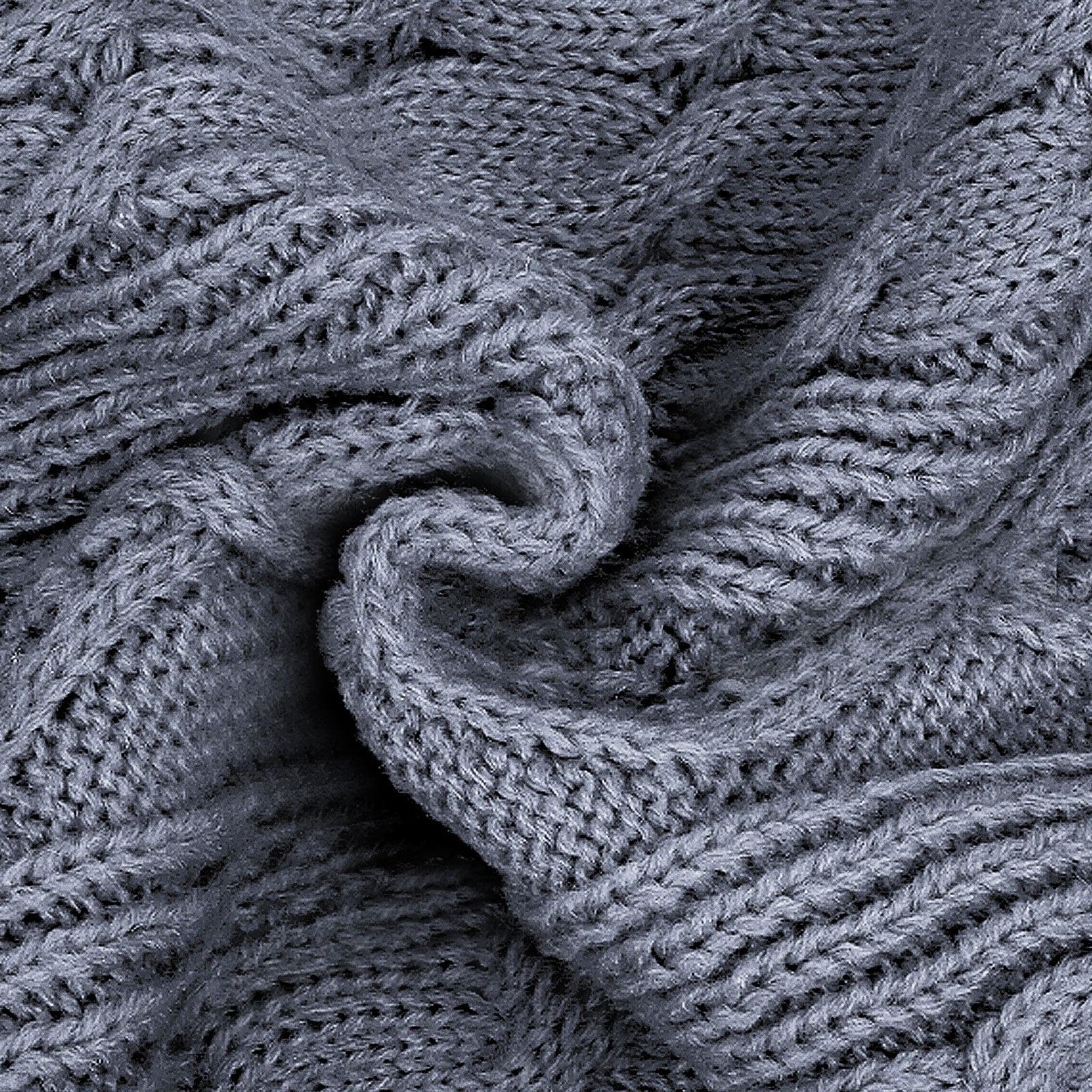 Gray cable knit dog sweater fabric close-up with twisted cable texture