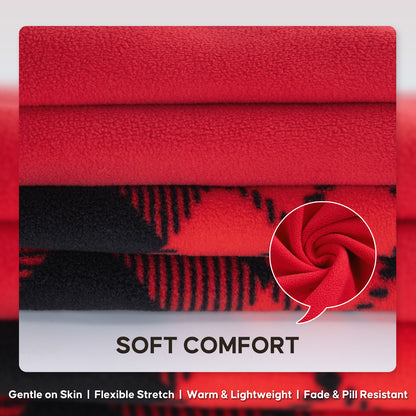 Folded red and black plaid velvet fabric beside solid red fabric swatches